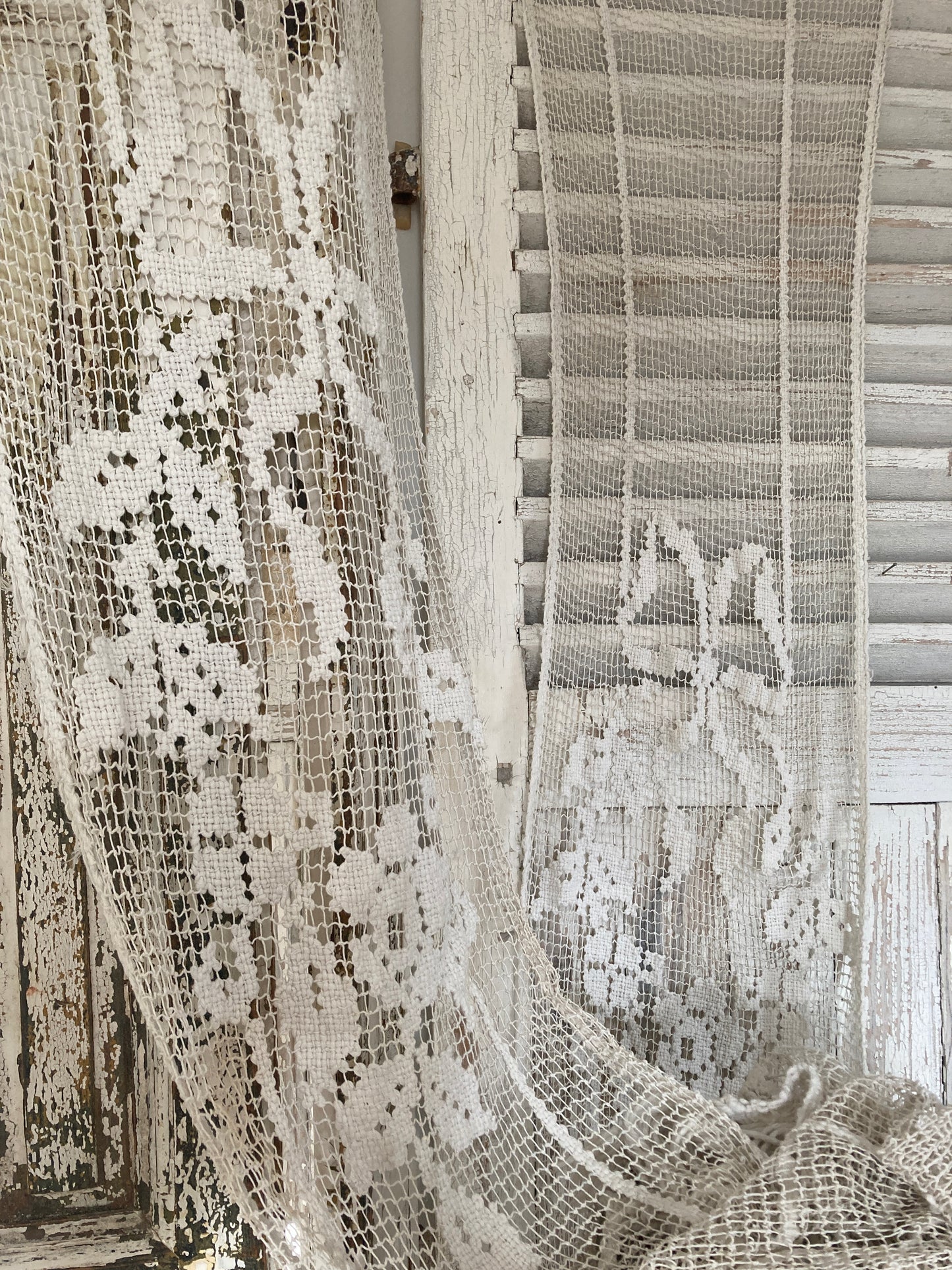 A pair of Antique French crochet / filet lace panels