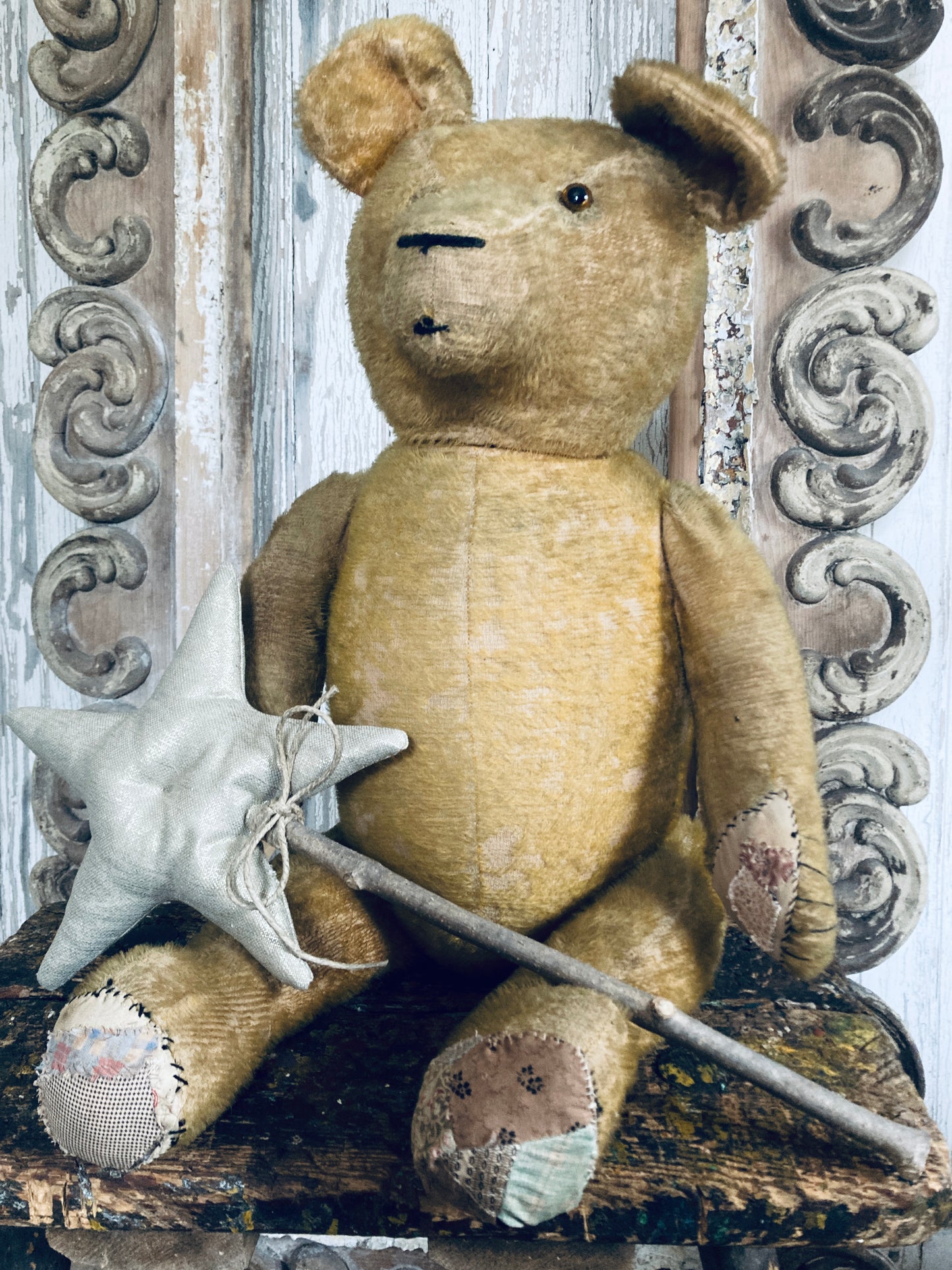 Large antique bear with star.