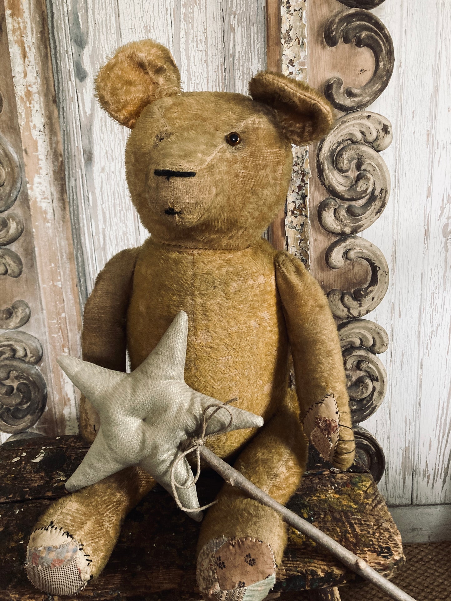 Large antique bear with star.