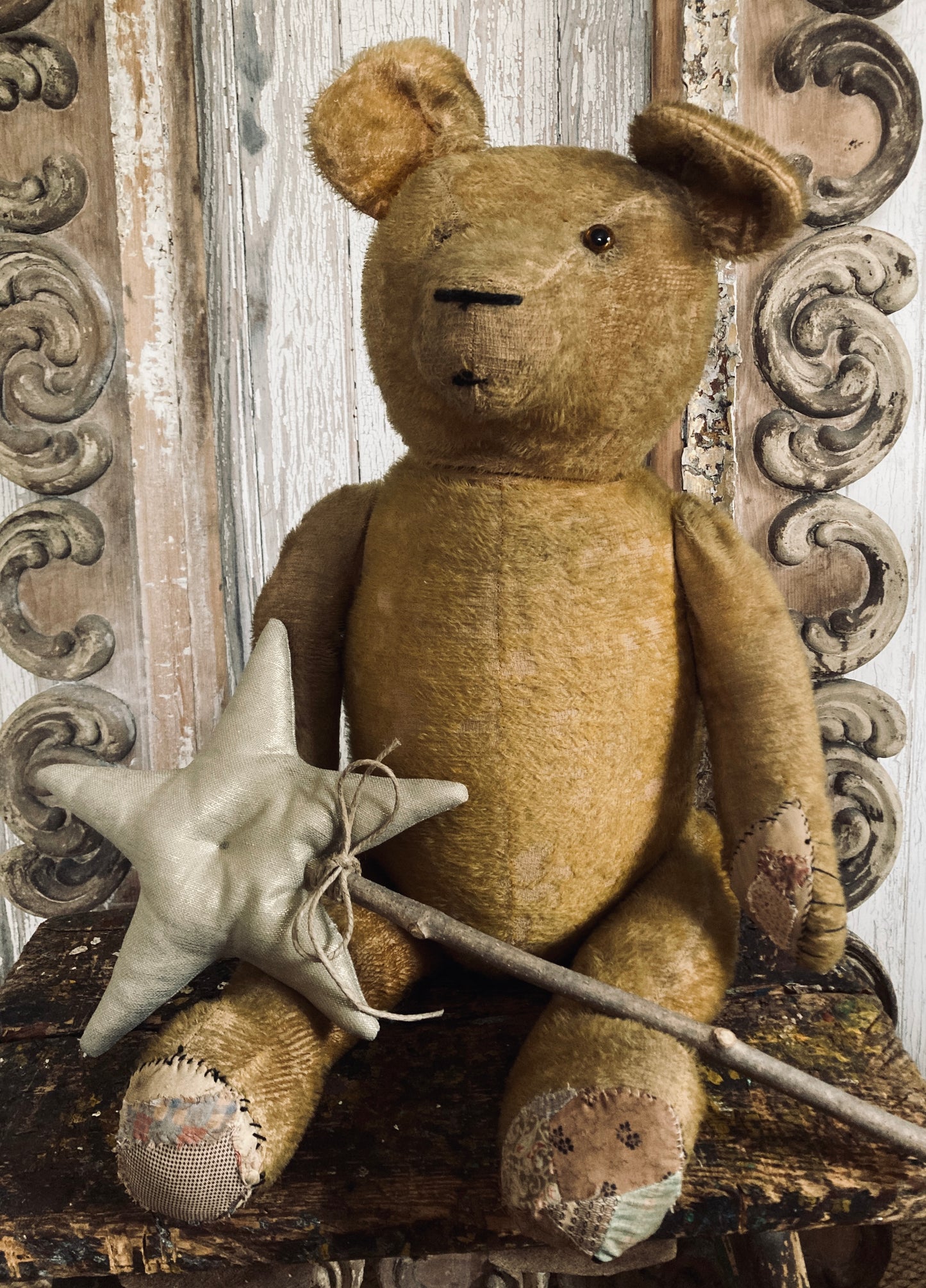 Large antique bear with star.