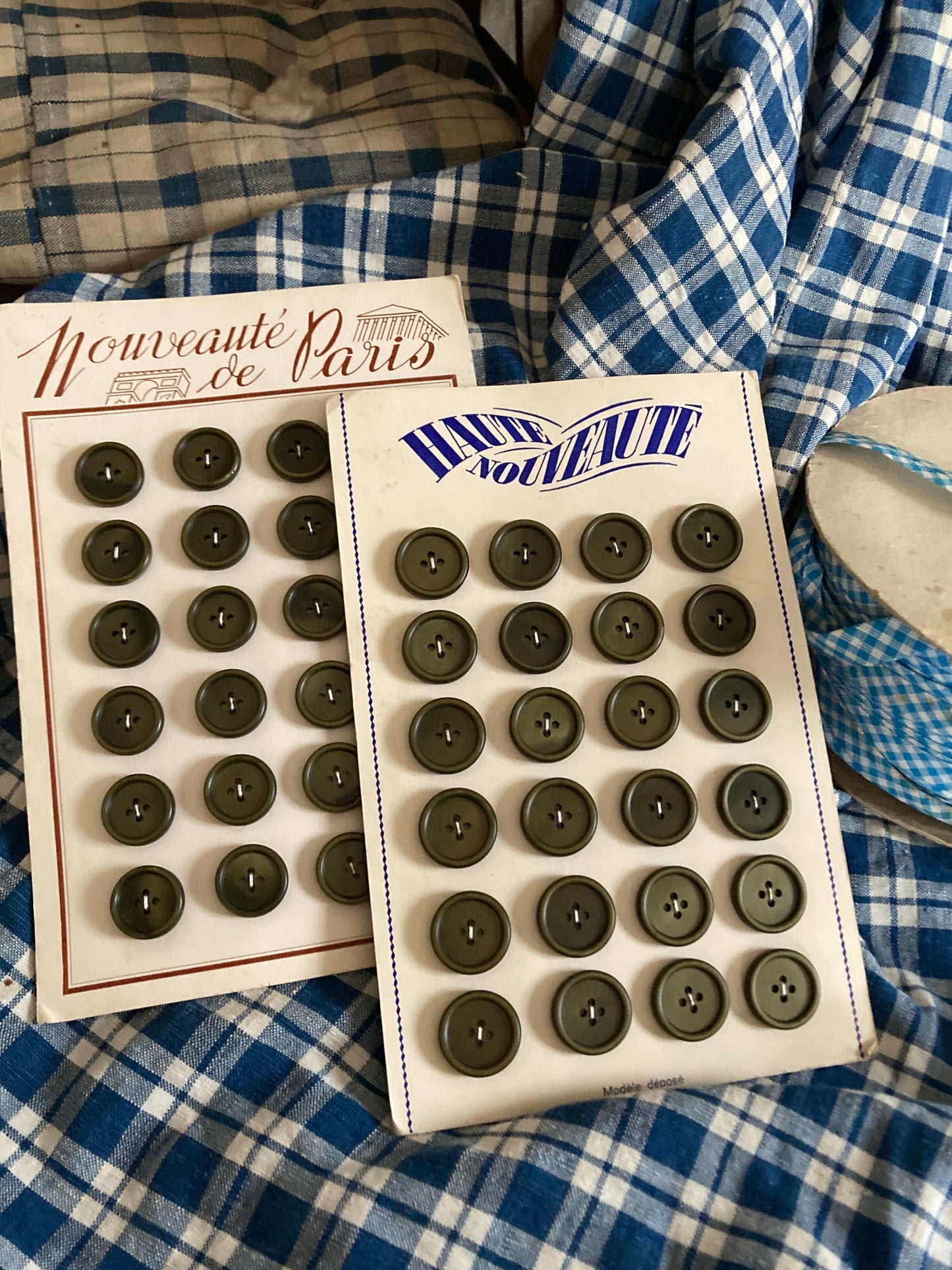 Vintage olive green french buttons.