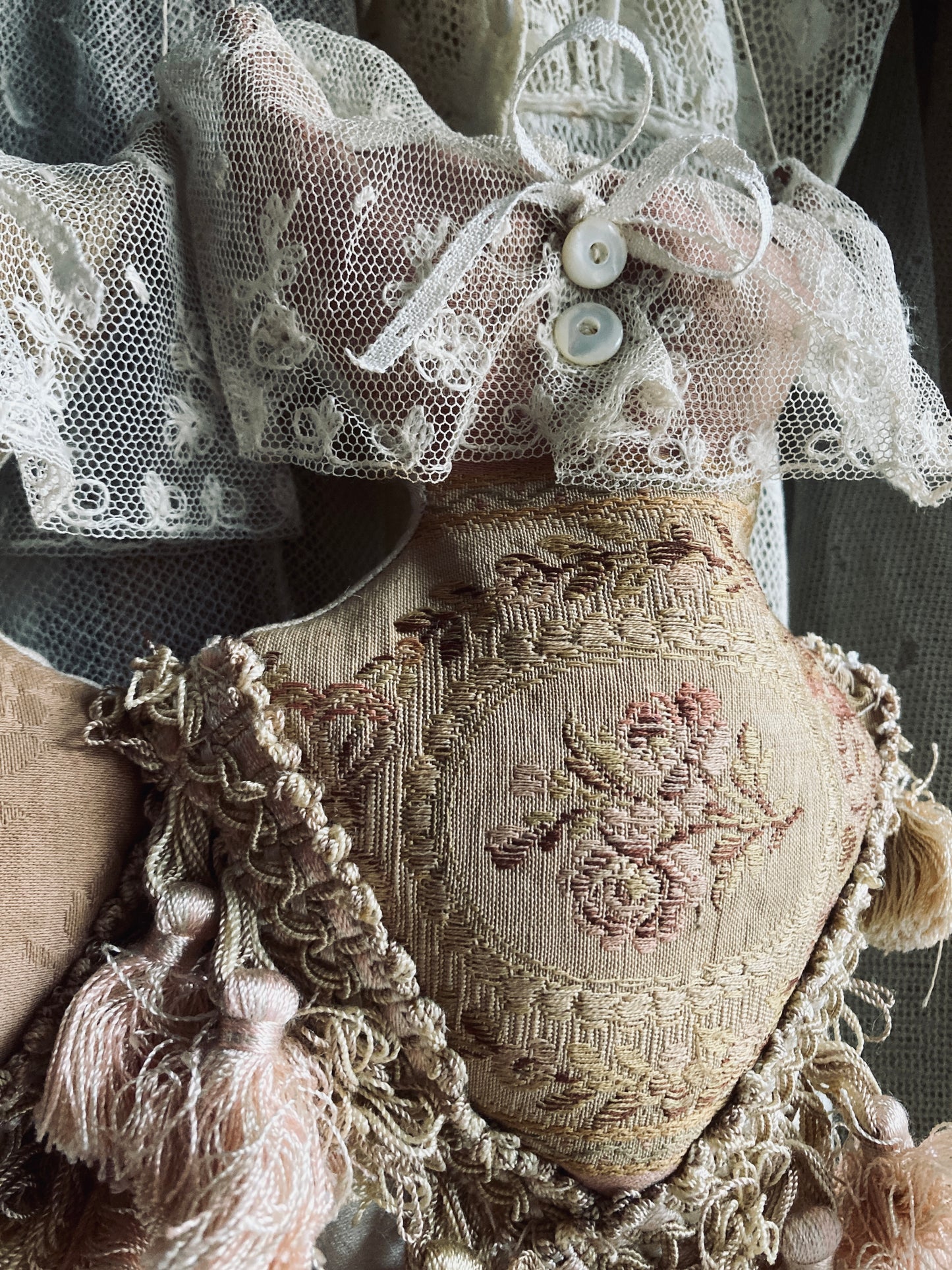 Lavender filled hanging corsets. Antique textiles.