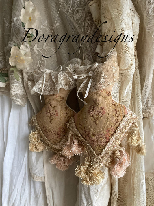 Lavender filled hanging corsets. Antique textiles.