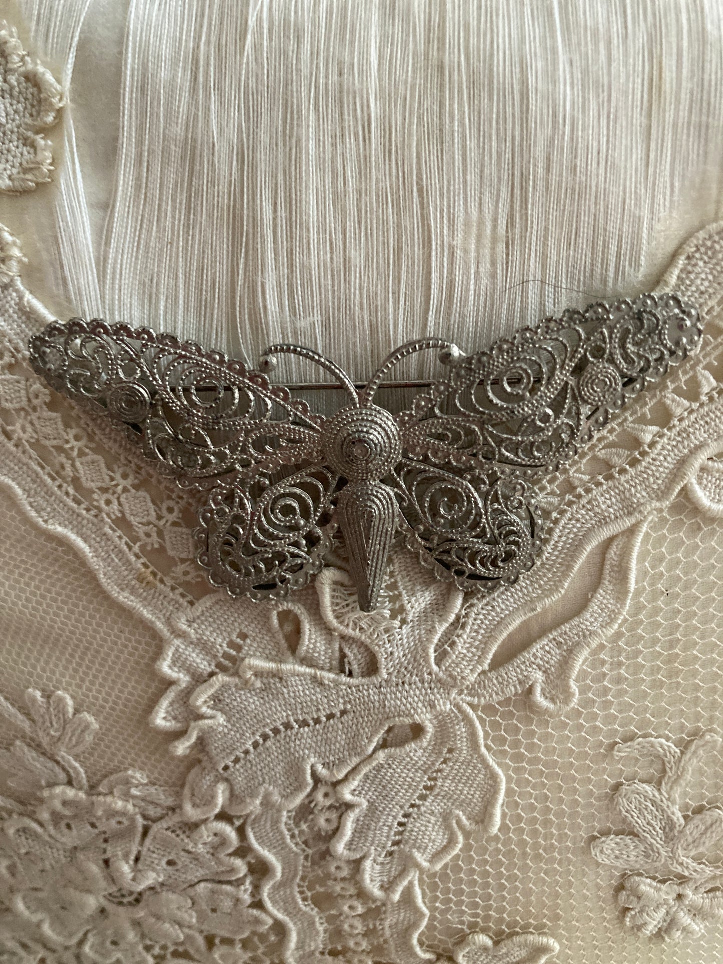 Vintage filigree butterfly brooch