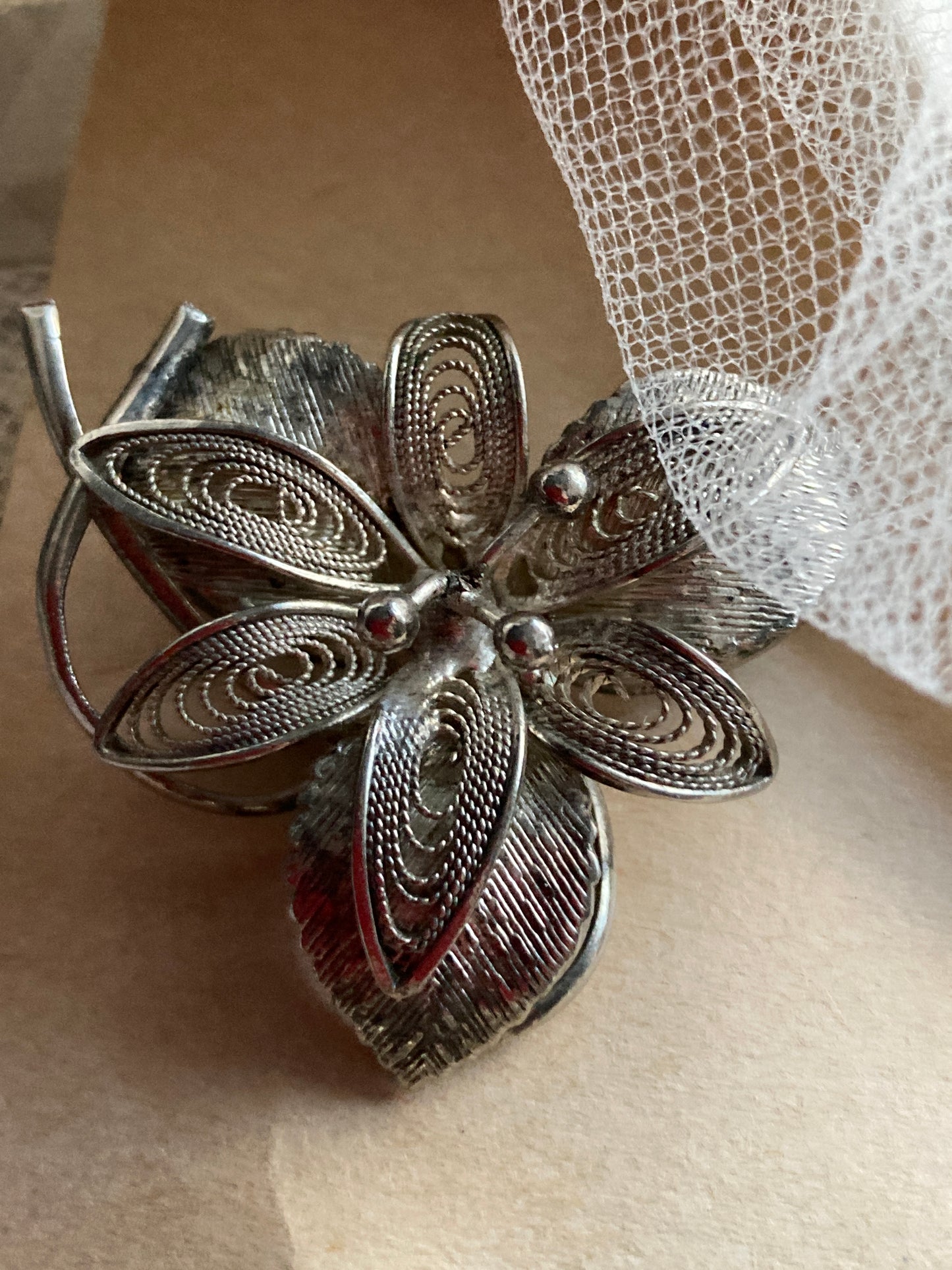 Pair of vintage filigree brooches