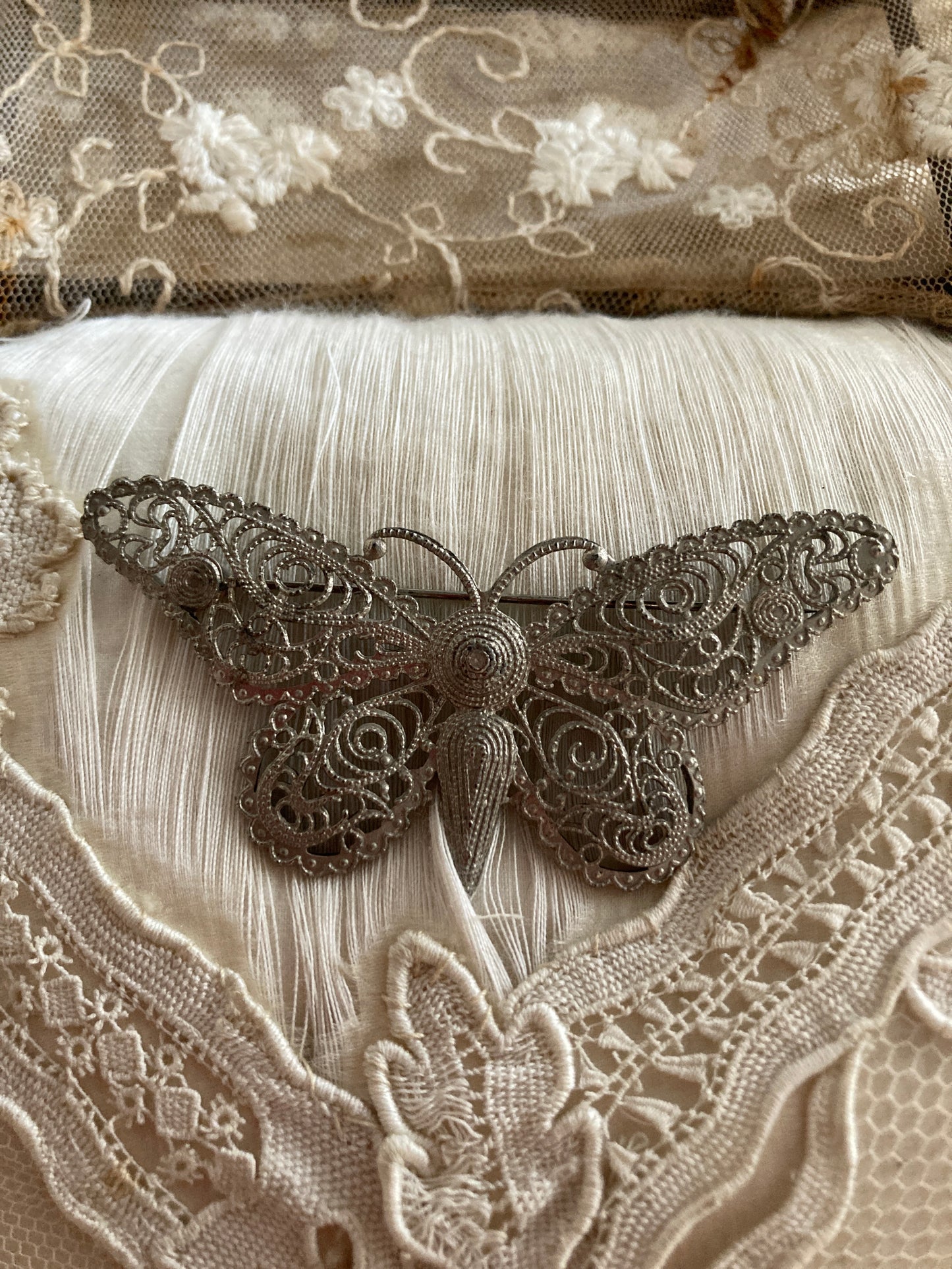 Vintage filigree butterfly brooch