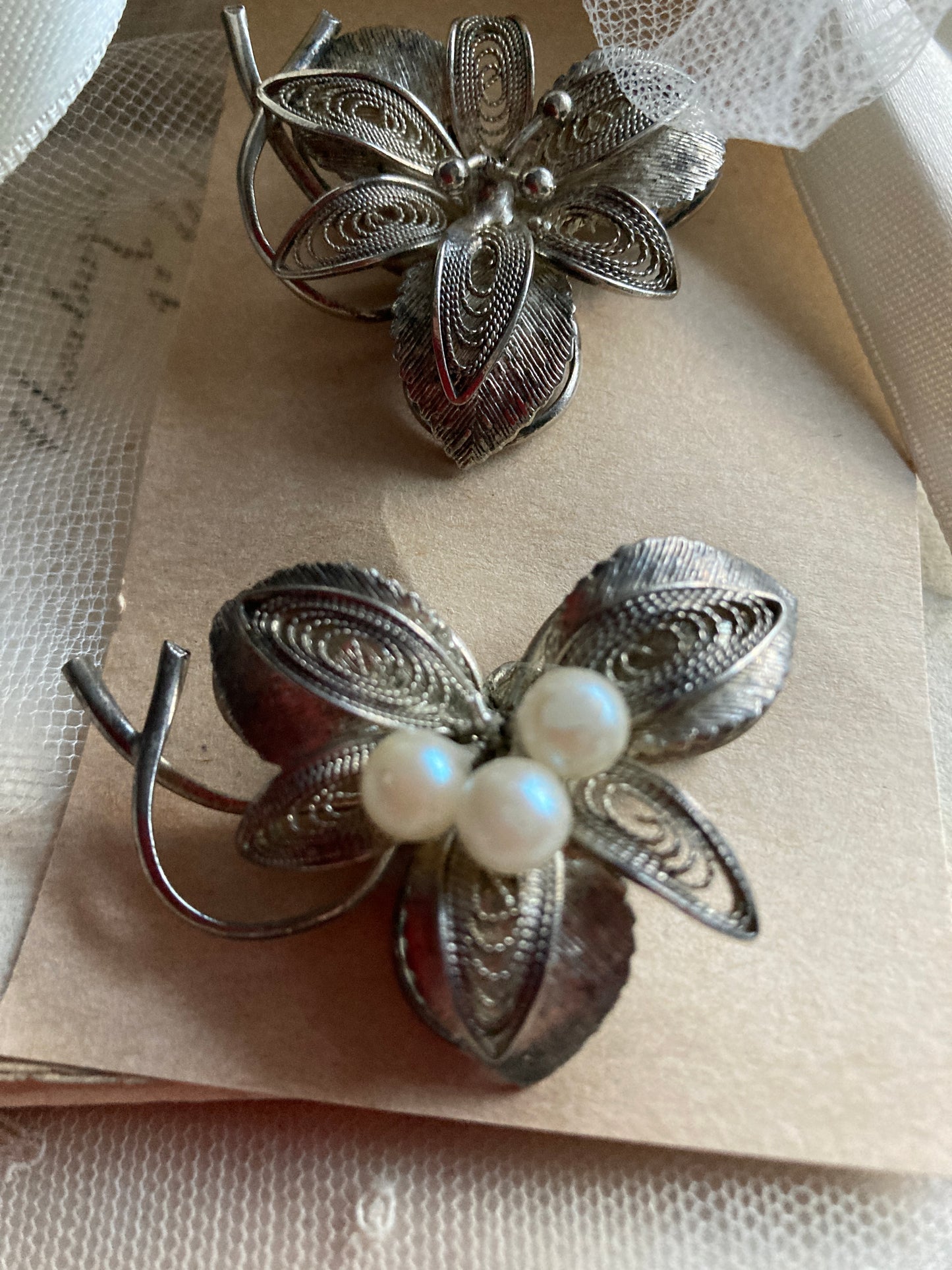 Pair of vintage filigree brooches