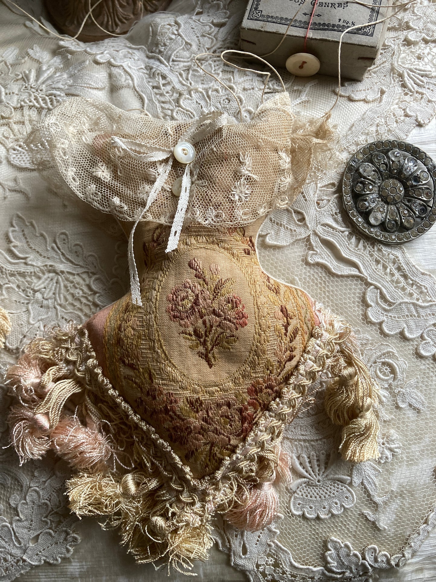 Lavender filled hanging corsets. Antique textiles.