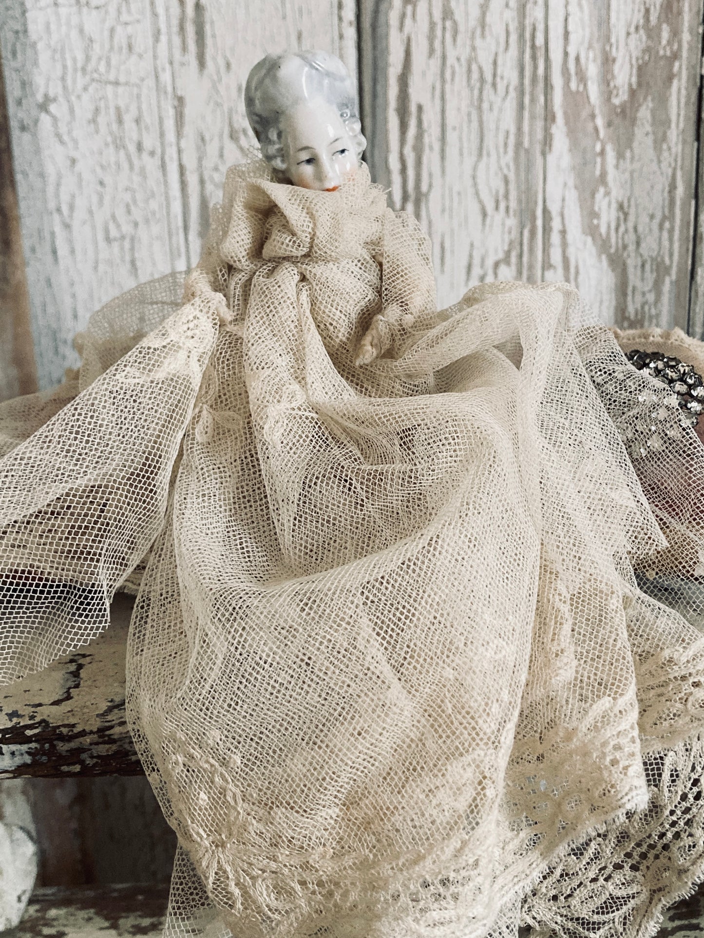 Antique German head and lace gown.