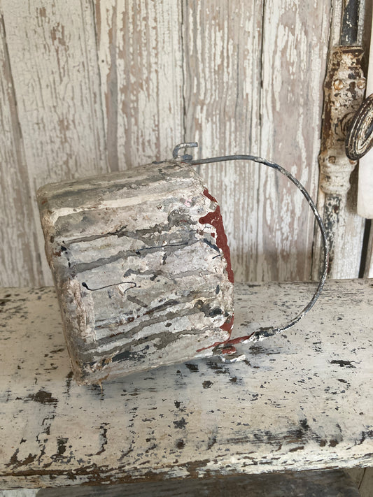 Tatty old paint can