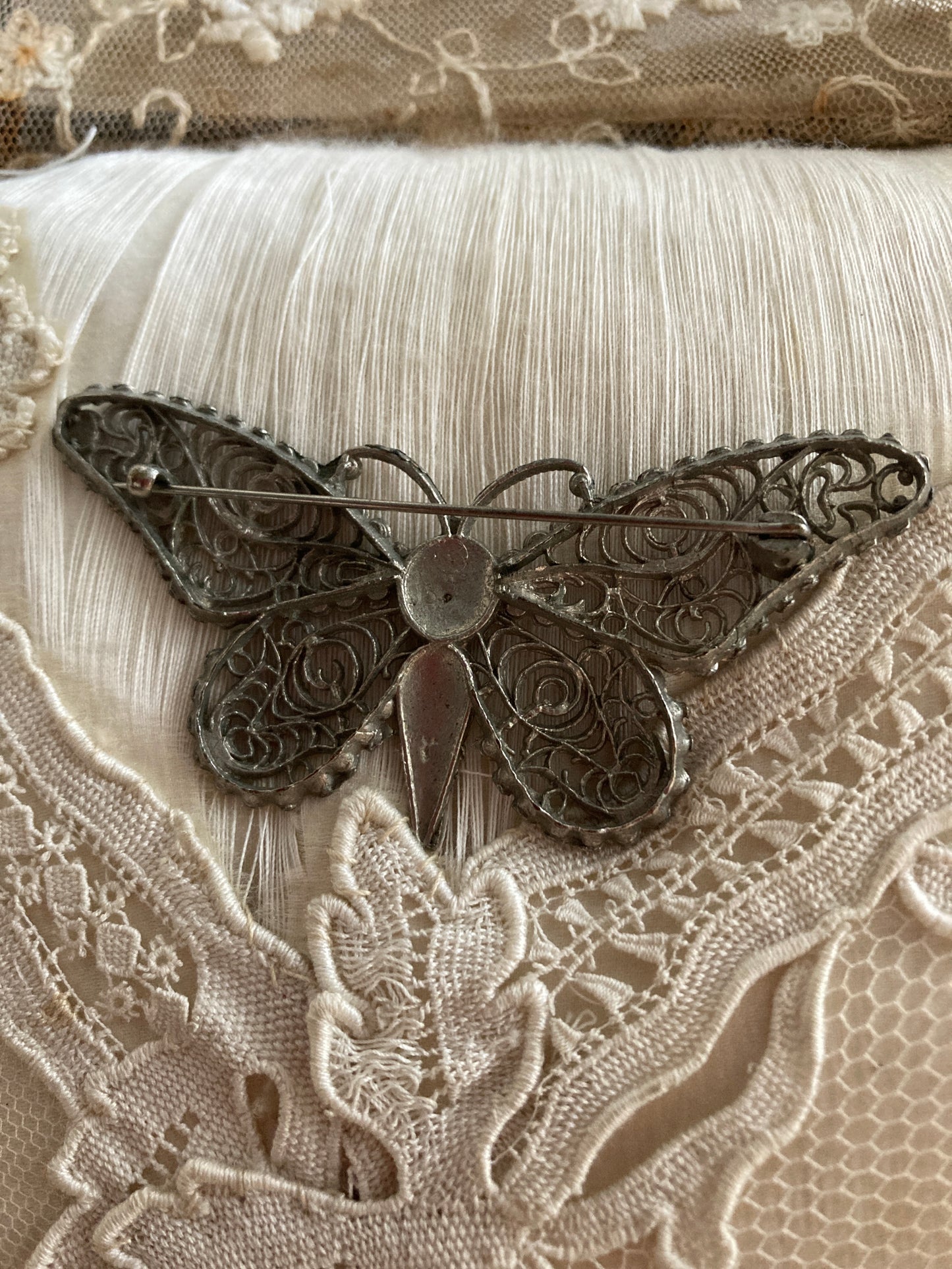 Vintage filigree butterfly brooch