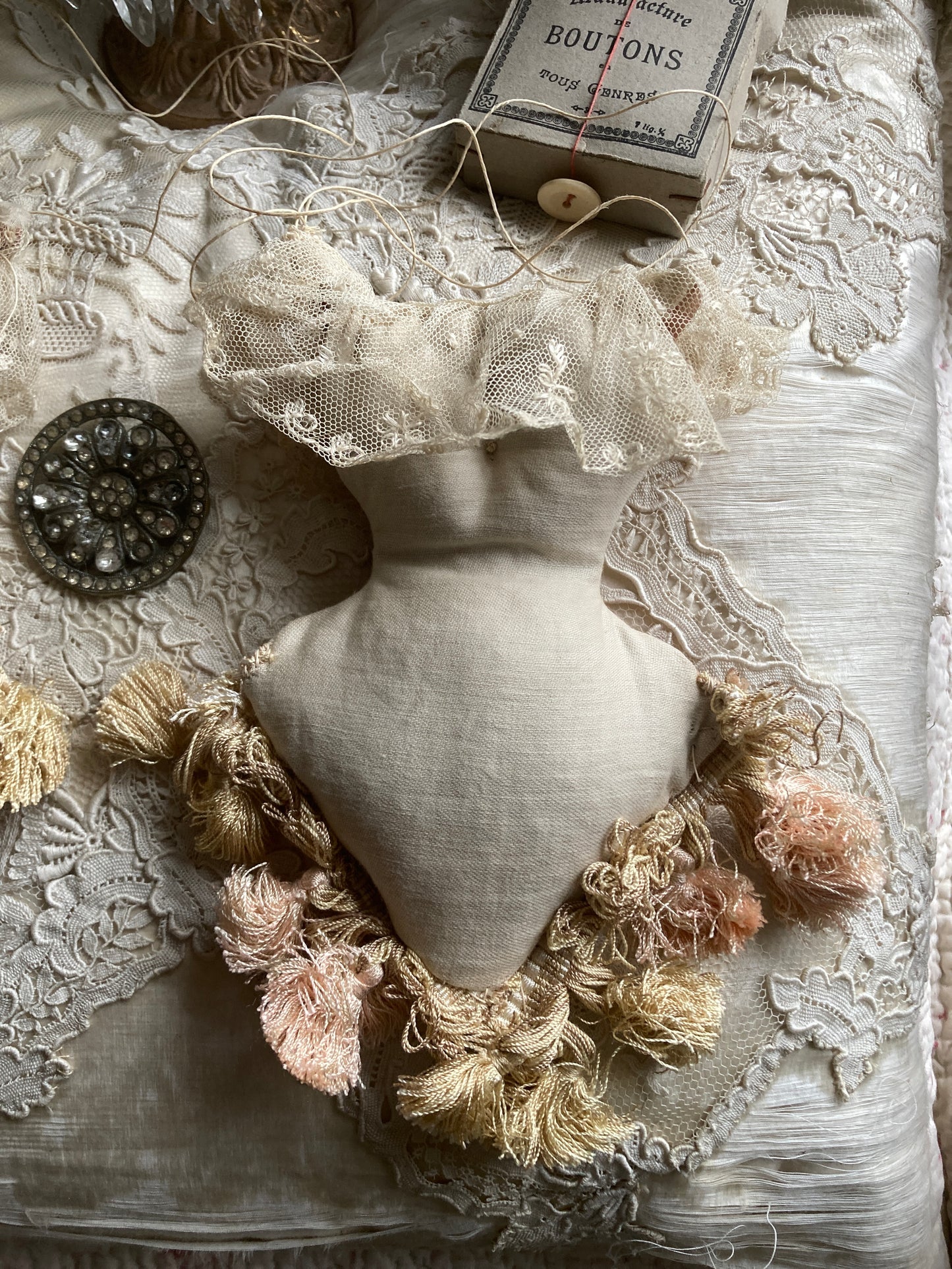 Lavender filled hanging corsets. Antique textiles.