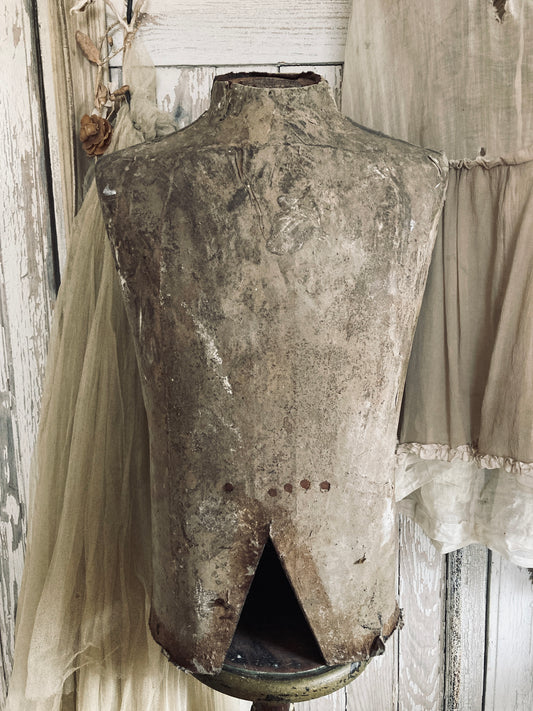 Shabby old mannequin top