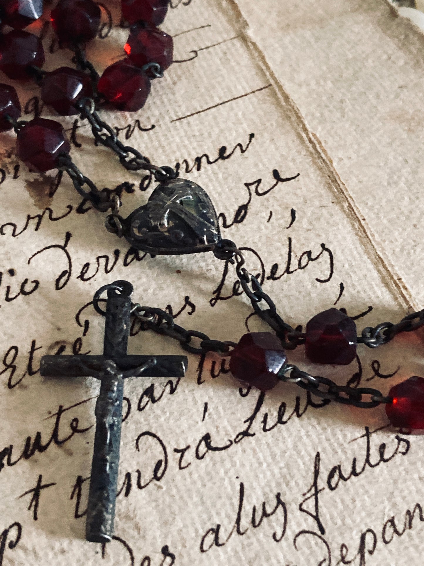 Antique hand cut faceted ruby glass rosary.