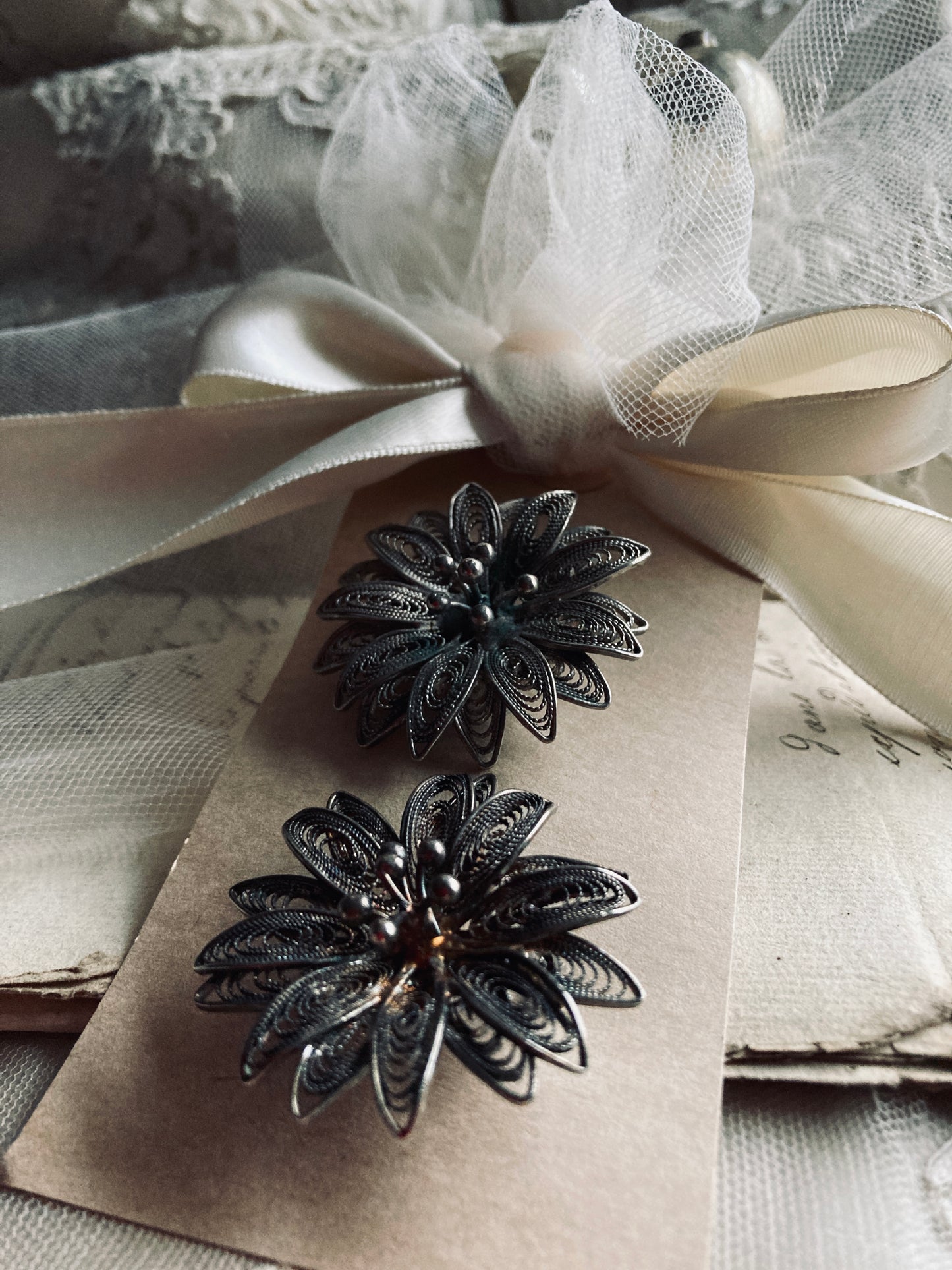 Pair of vintage filigree brooches