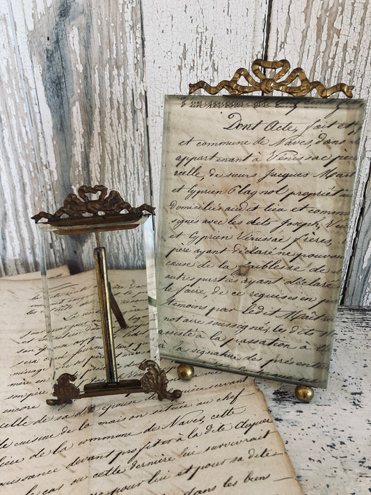 Antique french glass picture with ormulo bow top.