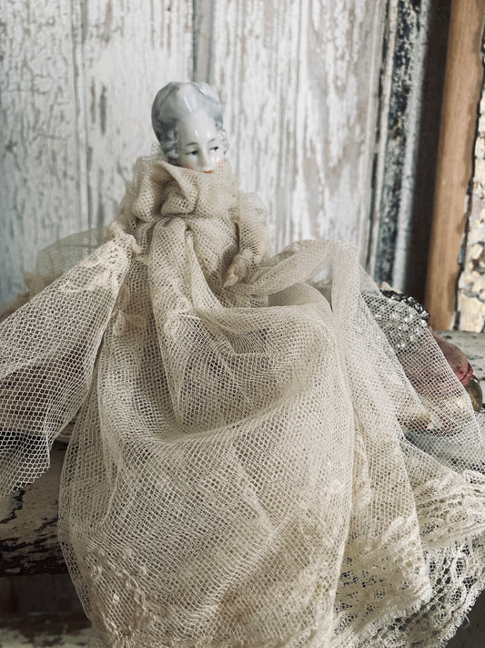 Antique German head and lace gown.