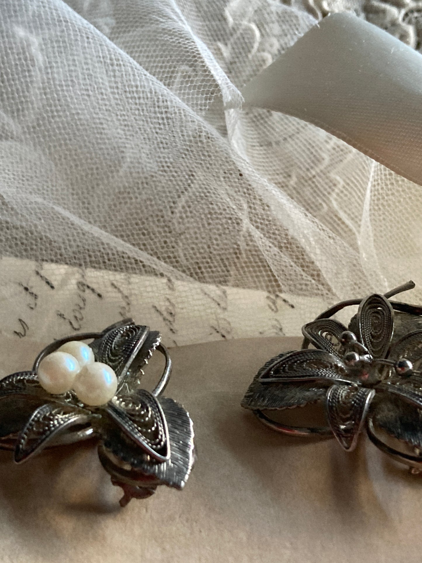 Pair of vintage filigree brooches