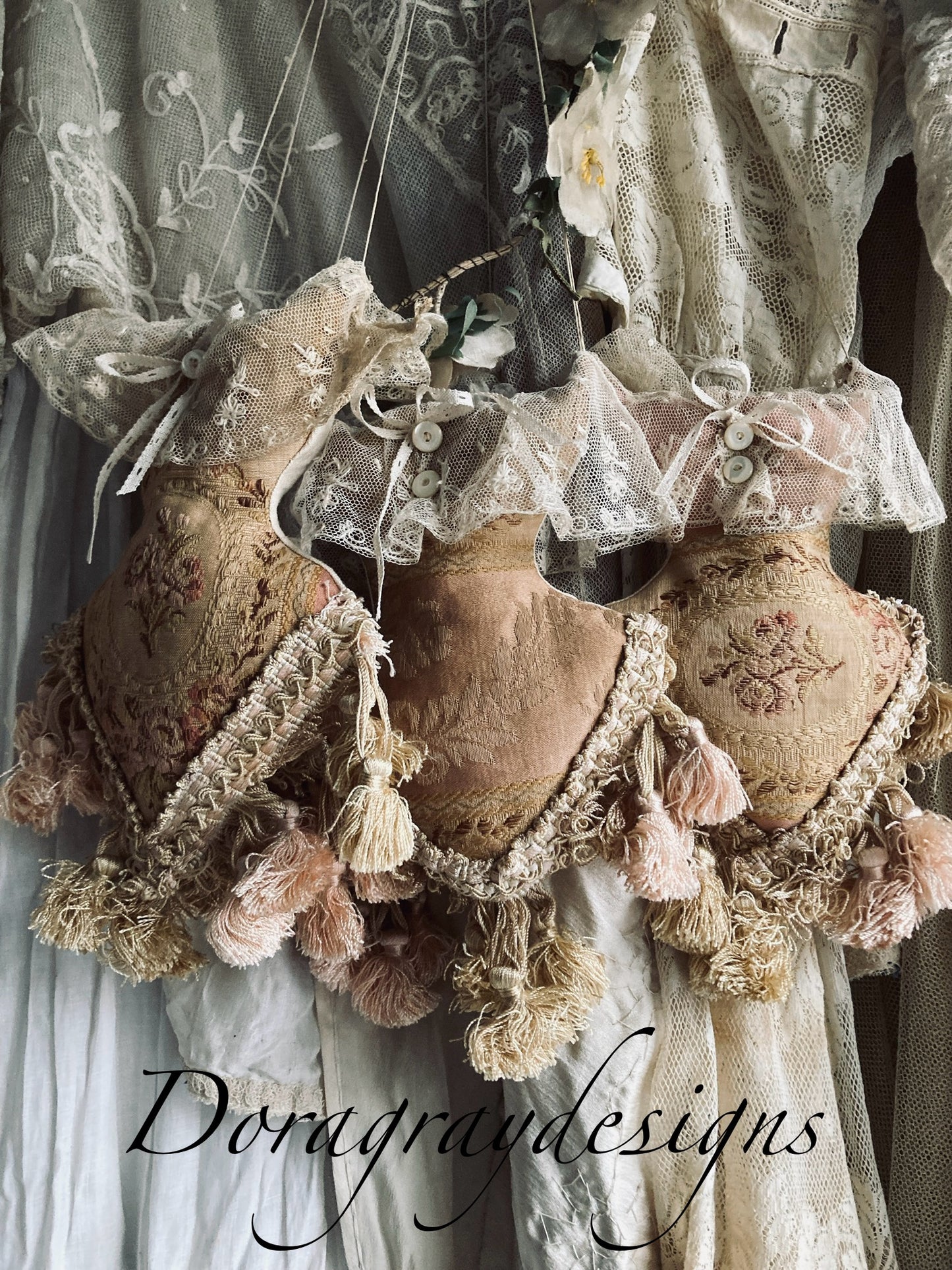 Lavender filled hanging corsets. Antique textiles.